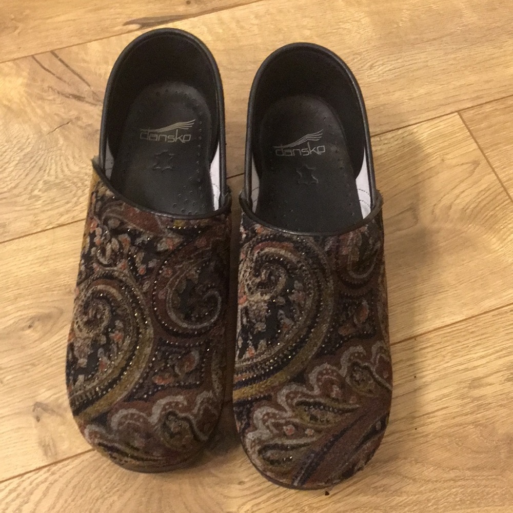 Rich colored Dansko clogs with a bit of sparkle.